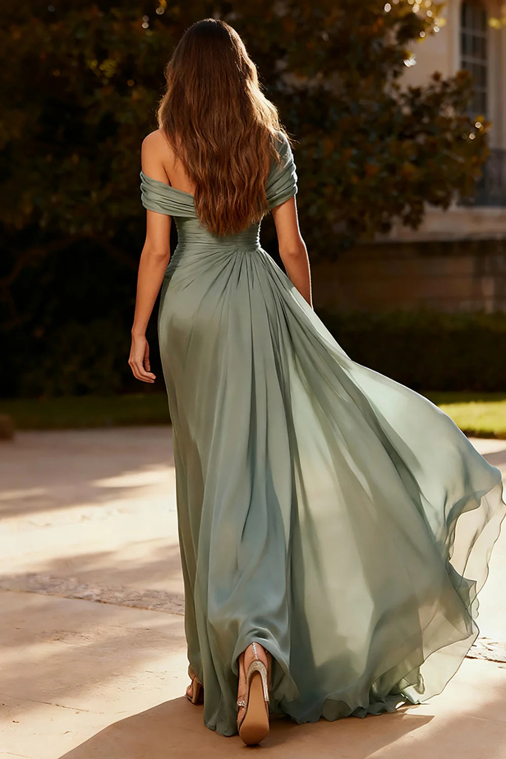 Back view of Dusty Sage A-Line formal dress showing flowing chiffon skirt.