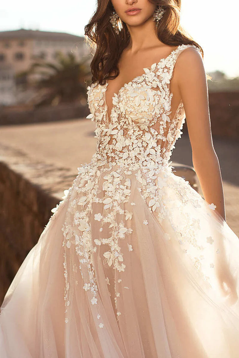 Back view of the sleeveless A-line wedding dress with intricate 3D lace details.
