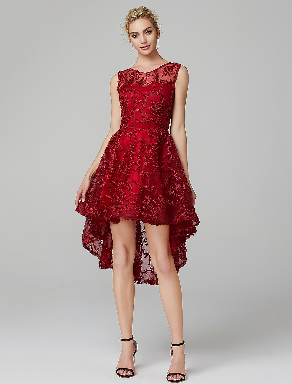 Back view of A-line sleeveless tulle dress with delicate appliques.