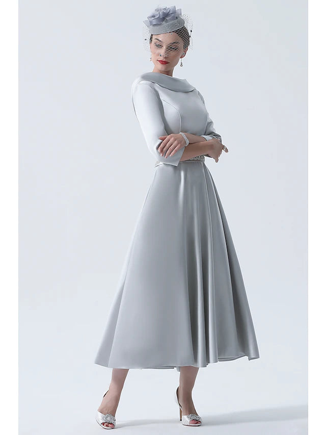 Full length view of the A-Line dress, highlighting its vintage style and elegant silhouette.