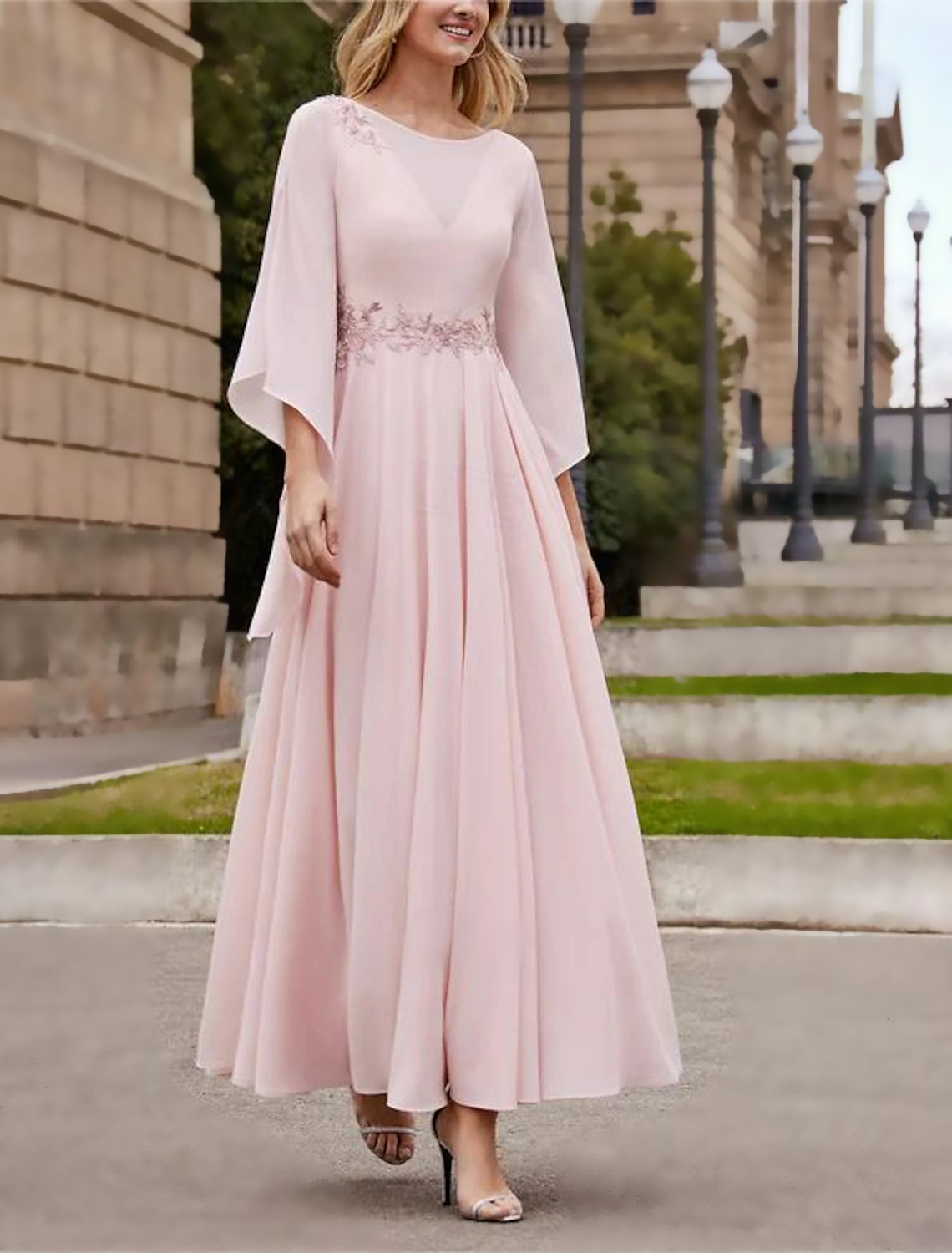 Elegant A-Line Mother of the Bride dress with bateau neckline and 3/4 sleeves.