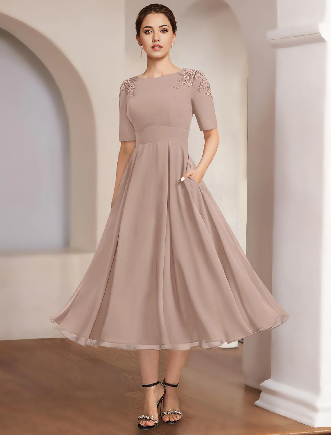 Side profile of the Mother of the Bride dress, highlighting the A-line silhouette and sleeve detail.