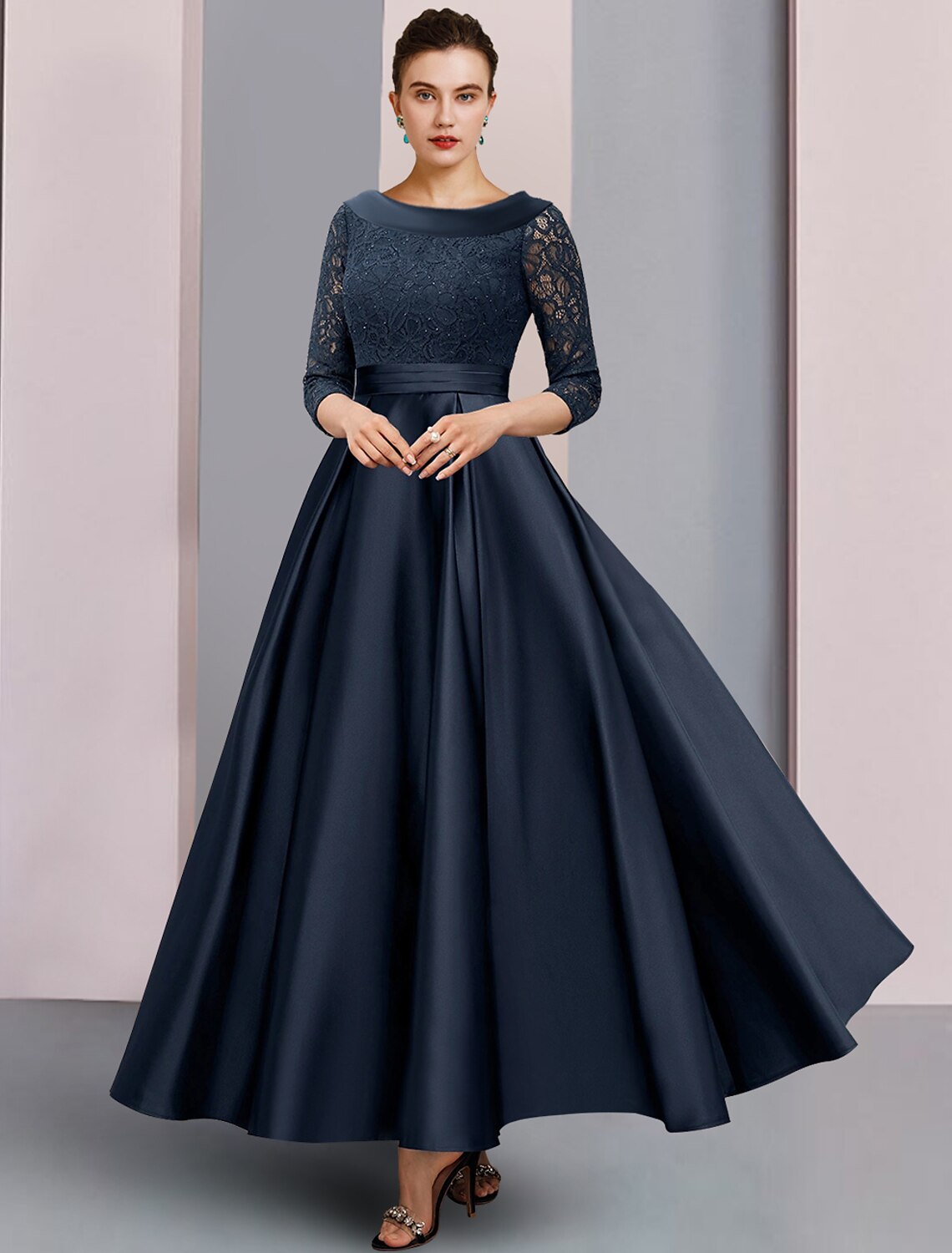 Elegant A-Line Mother of the Bride gown with bateau neck and 3/4 sleeves.