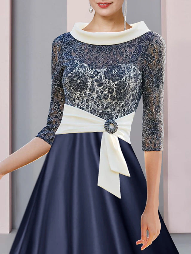 Side view of the A-Line formal dress showing satin lace details.