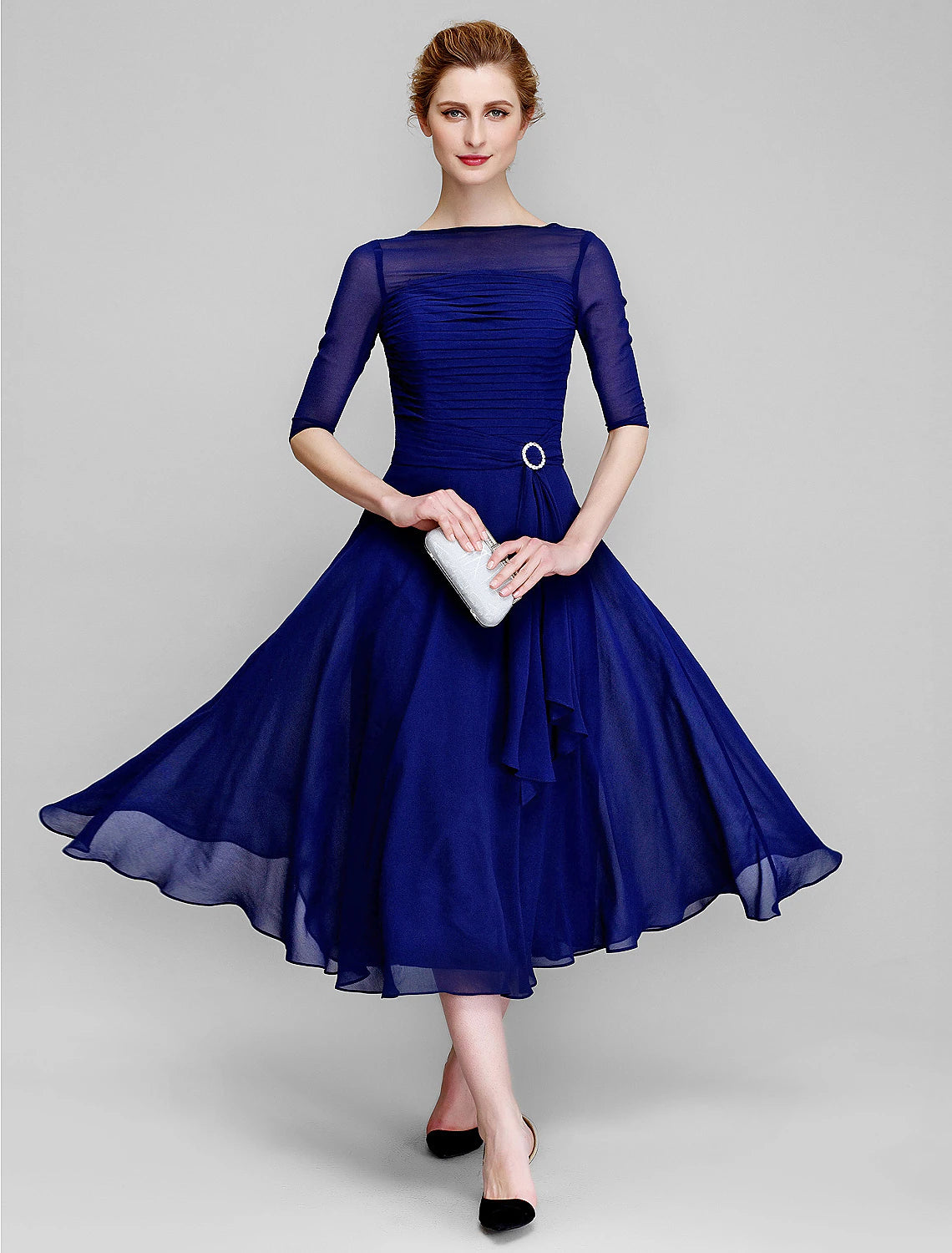 Elegant A-Line bateau neck gown with half sleeves and ruched details.