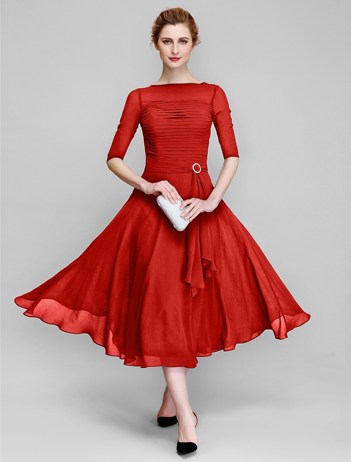 Back view of the A-Line tea length gown, showcasing its silhouette.