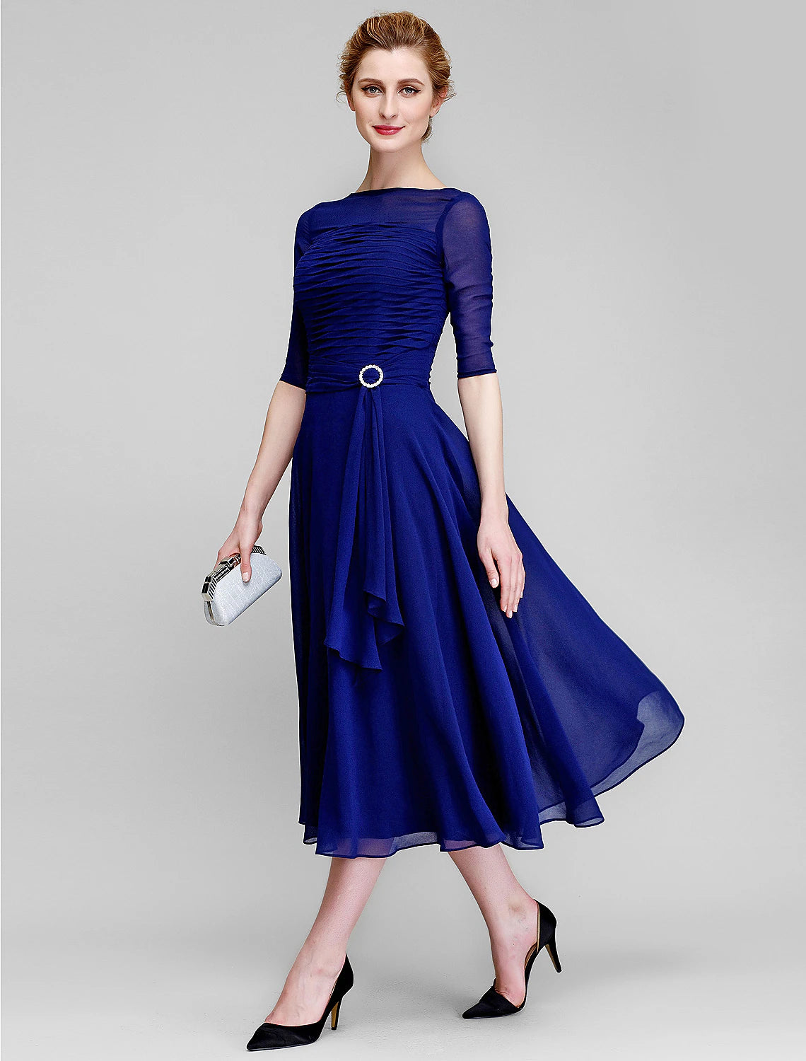 Chiffon fabric detail of the elegant plus size wedding guest dress.