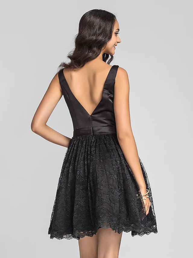 Black bridesmaid dress with a flowing A-line skirt.