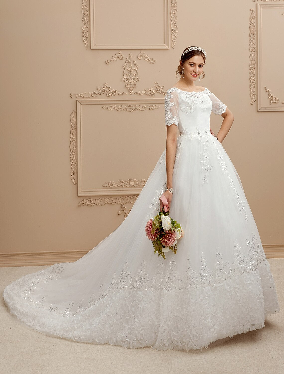 Wedding dress with a bateau neck and A-line skirt, designed for a graceful bridal look.
