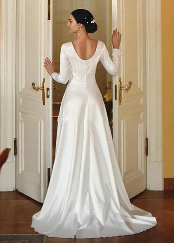 Side view of an elegant satin bridal gown.