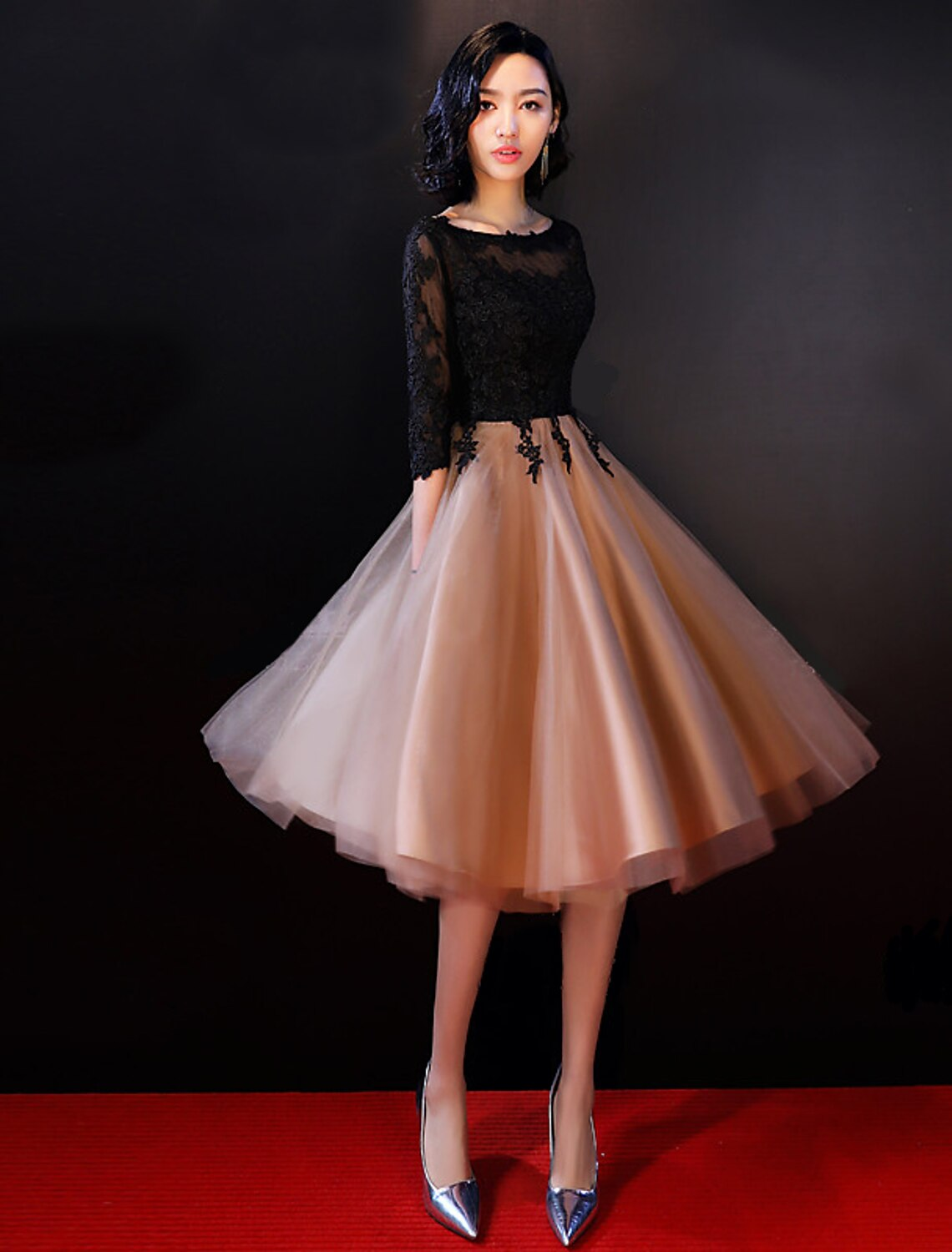 Side view of the knee-length A-Line dress for special occasions.