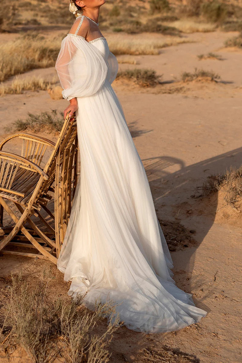 Back view of the elegant A-line wedding dress, highlighting its silhouette.