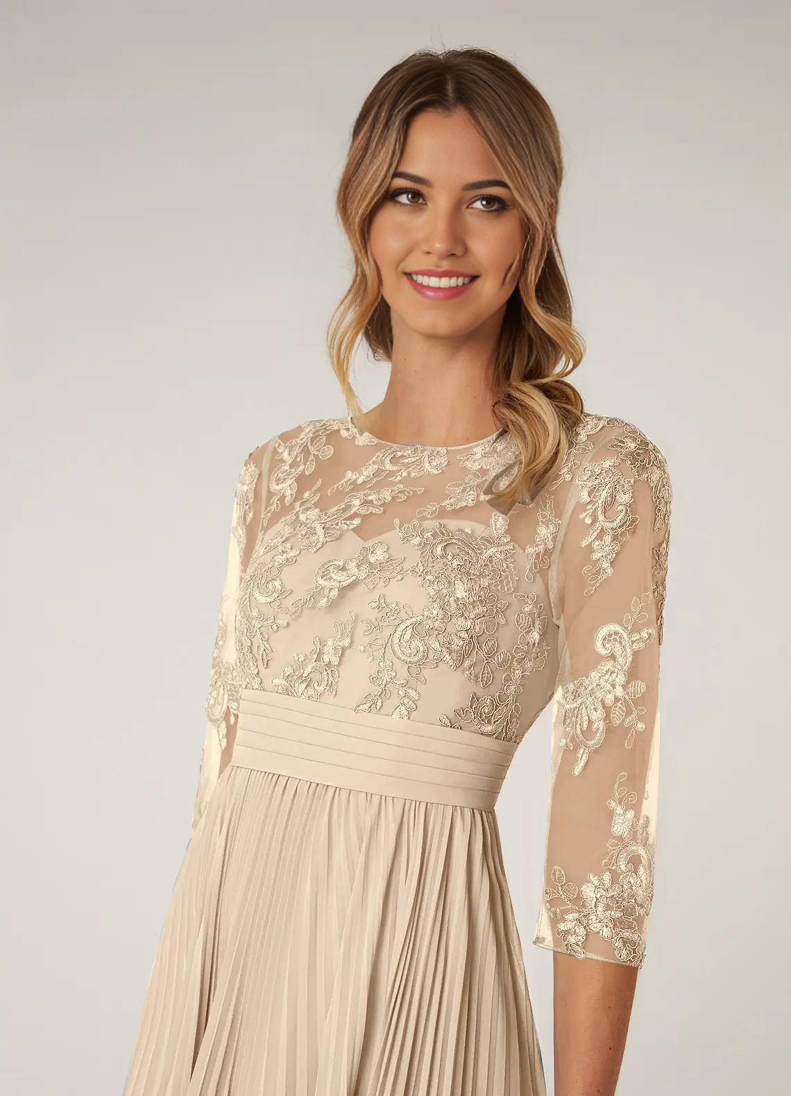 Full view of a champagne A-line Mother of the Bride dress with a boatneck.