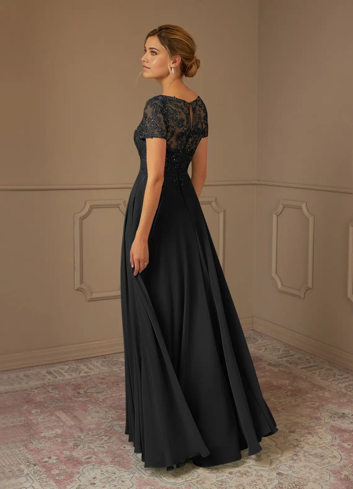 Side view of the black A-line sequin chiffon dress, highlighting the silhouette.