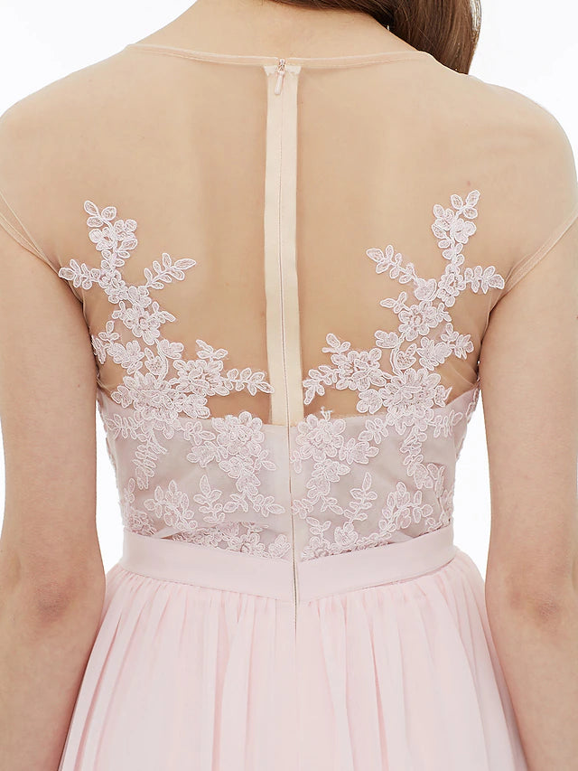 Detail of the ribbon or sash on the elegant bridesmaid gown.