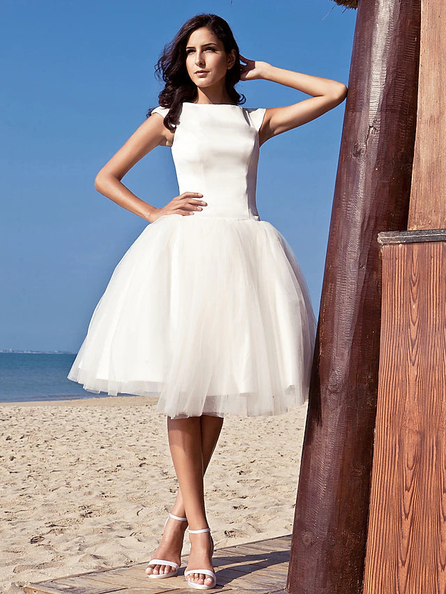 Back view of the A-Line Cap Sleeve Bateau Neck Satin White Knee Length Wedding Dress.