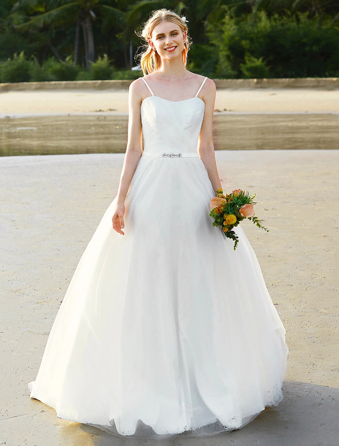 Bridal gown with sashes or ribbons detail.