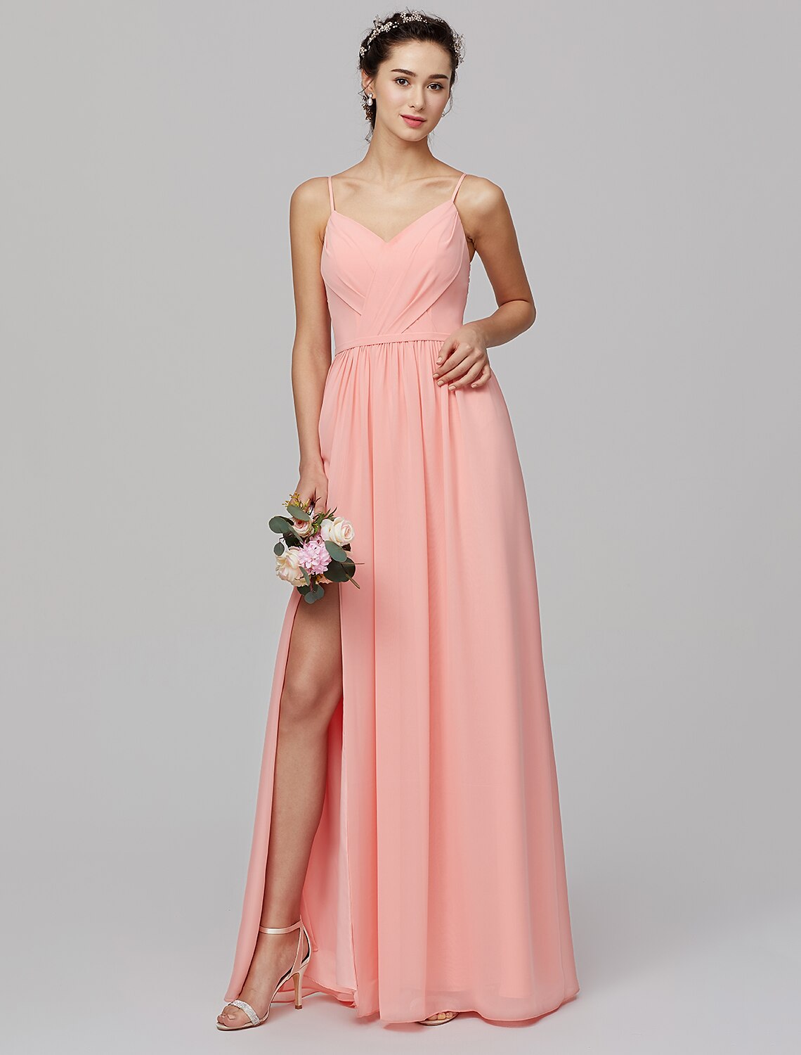 Model wearing an elegant A-line chiffon bridesmaid dress with spaghetti straps and a split front.