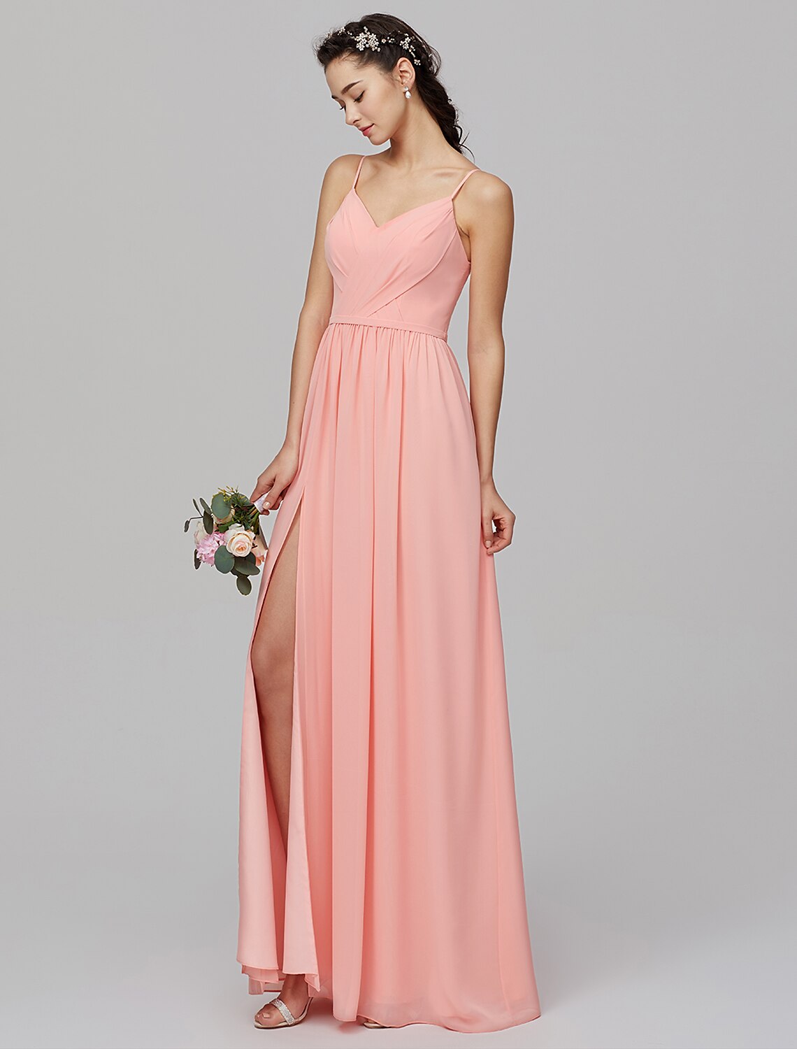 Back view of the A-line chiffon bridesmaid dress, showing criss-cross spaghetti straps.
