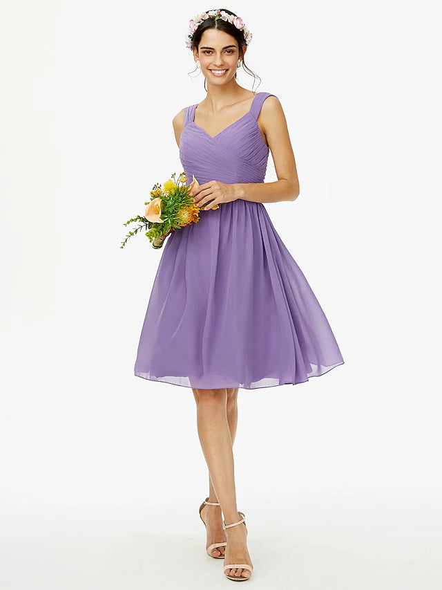 Elegant A-line chiffon bridesmaid dress with delicate straps and open back.