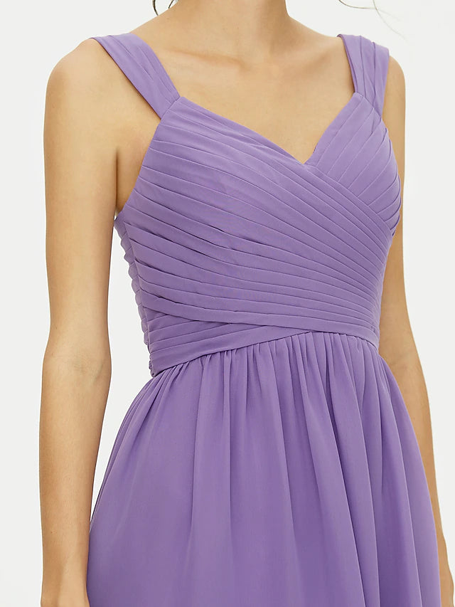 Close-up of chiffon fabric and strap detail on bridesmaid dress.