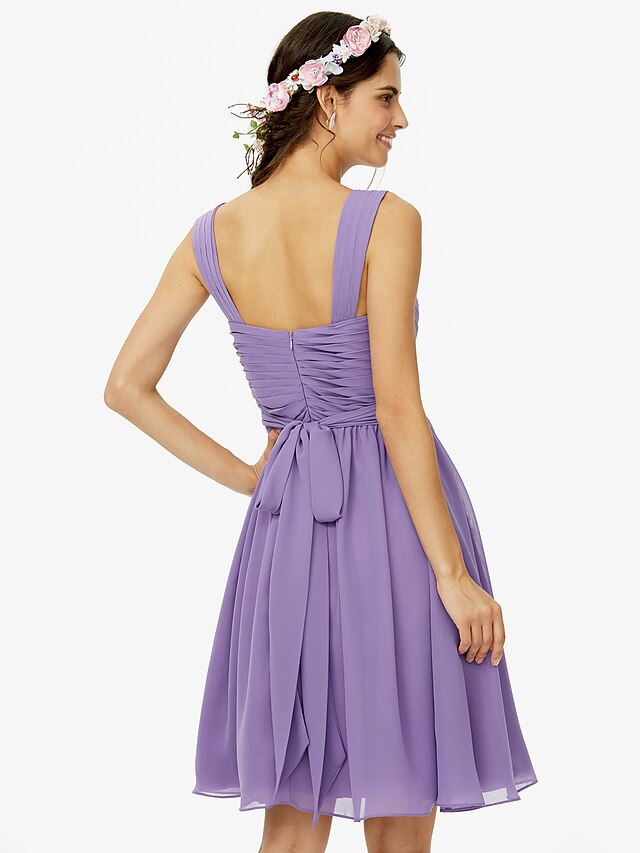 Model wearing A-line chiffon bridesmaid dress, showcasing the flowy skirt.
