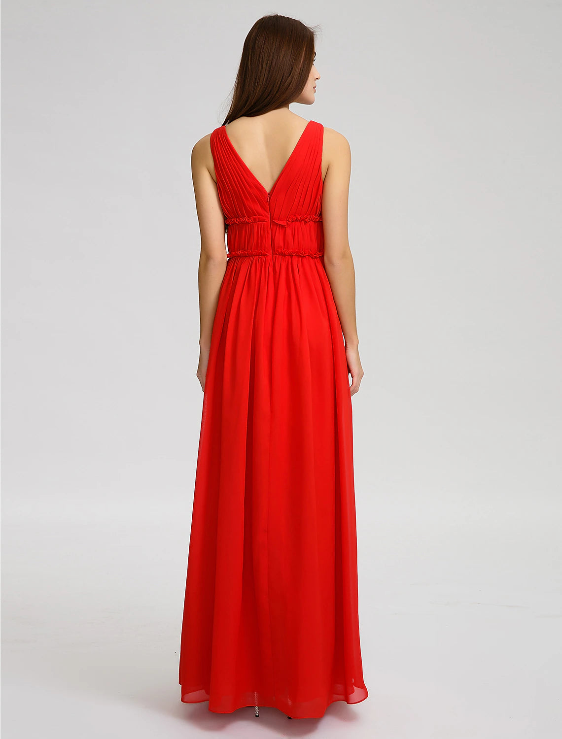 Back view of the floor-length A-line bridesmaid dress, showing the open back and criss-cross details.