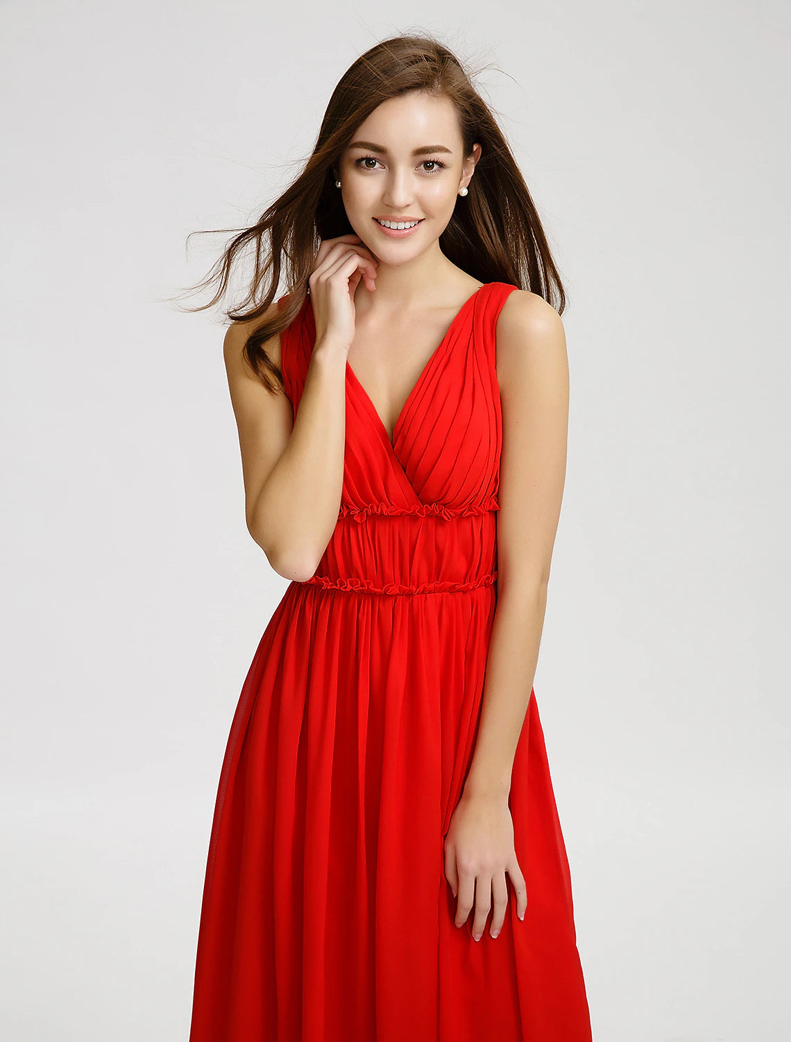 Side profile of the flowing A-line chiffon dress, highlighting the skirt and silhouette.