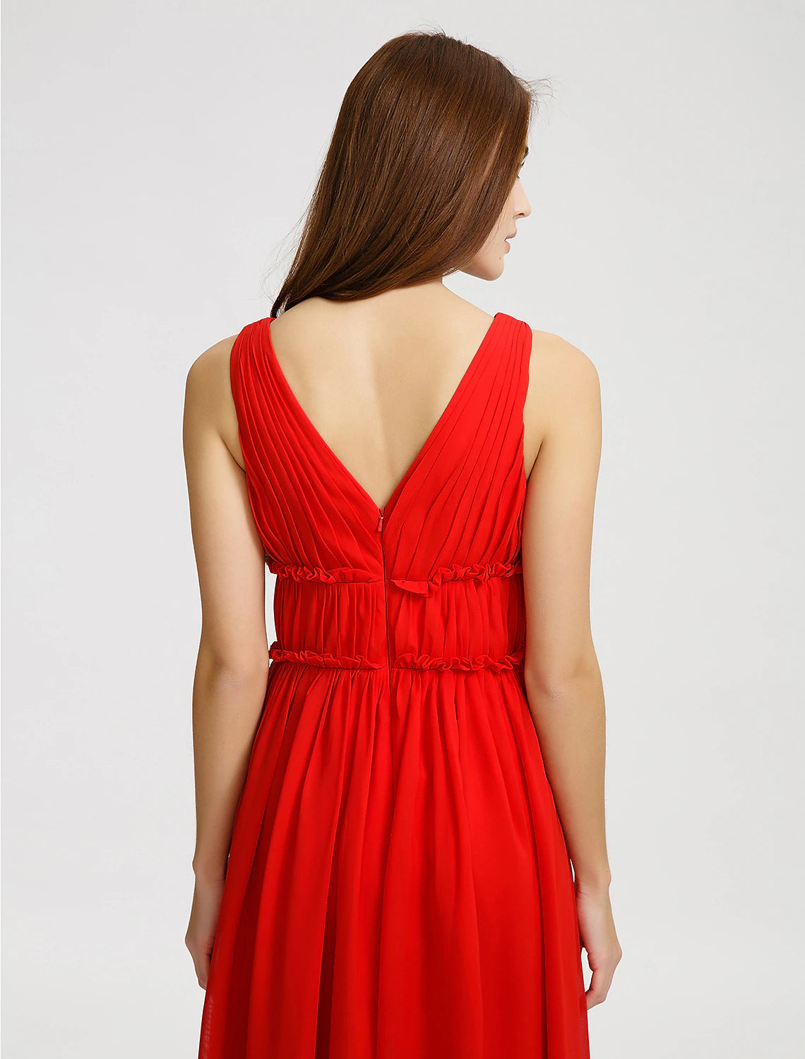 Detail of the side draping and texture on the sleeveless chiffon bridesmaid gown.