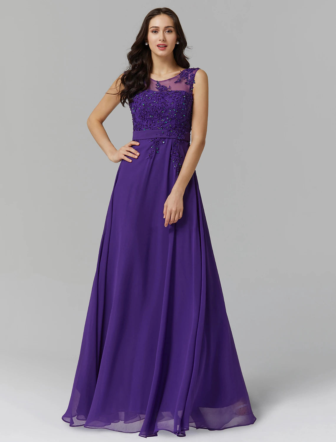 Elegant A-line chiffon evening dress with illusion neckline and beading.