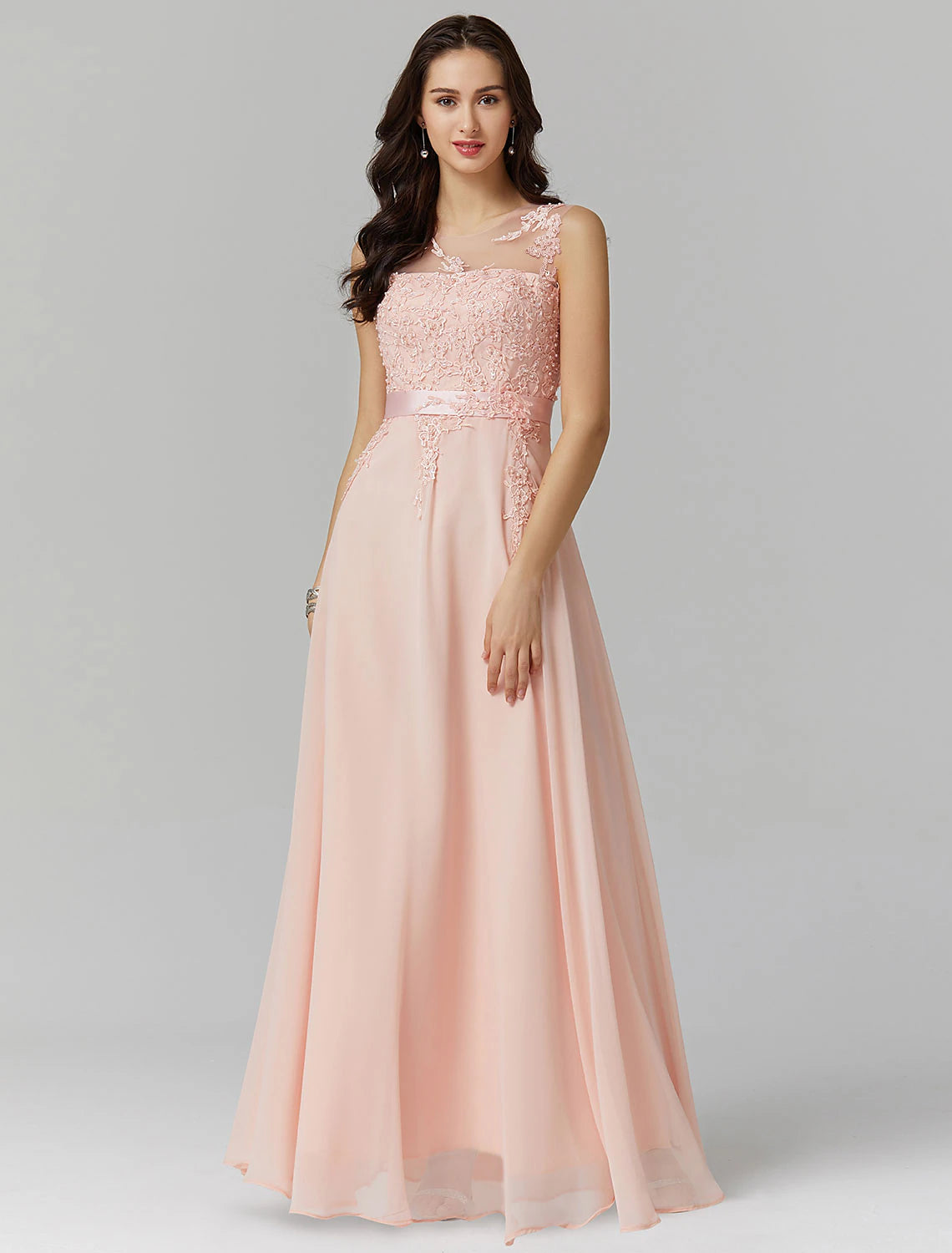 Back view of A-line chiffon dress showing V-back and delicate appliques.
