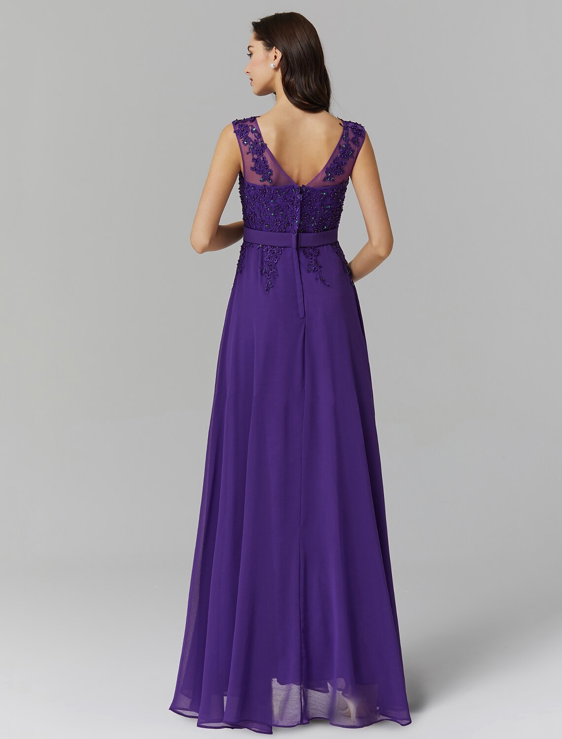 Detail of the V-back design on the elegant chiffon evening dress.