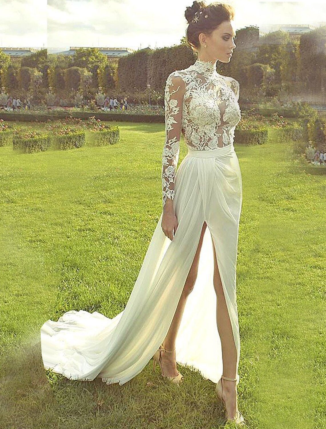 Elegant A-line chiffon beach wedding gown with high neck and long sleeves, front view.