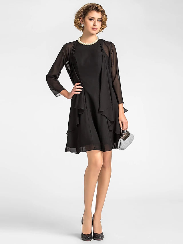Woman wearing an elegant A-line chiffon dress with a jewel neck and 3/4 sleeves.