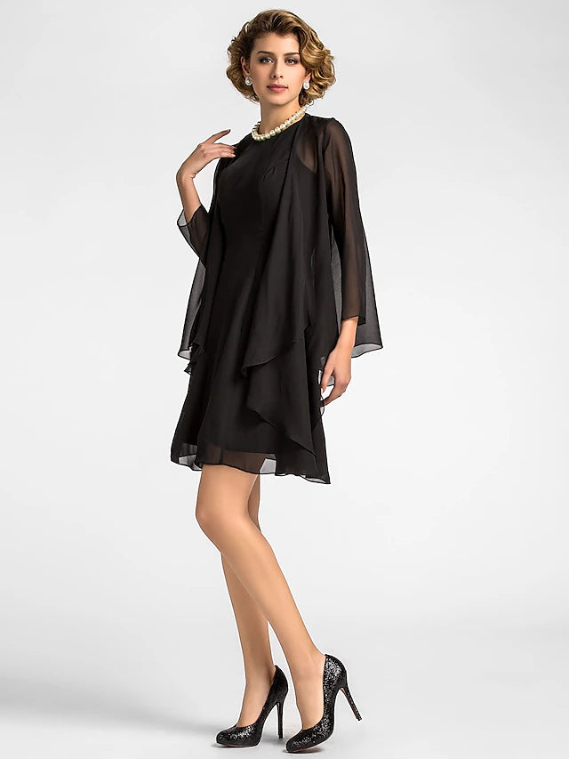 Back view of the A-line chiffon dress, showing the knee-length hem and draping.