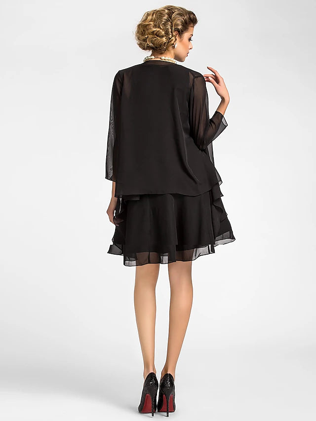 Woman posing in the A-line dress, showcasing the included matching wrap.