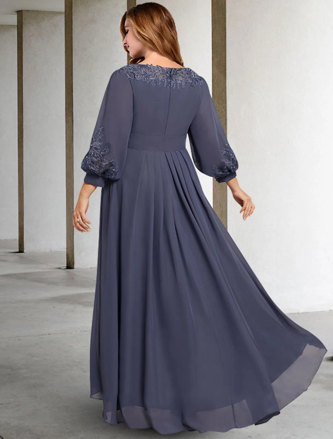 Formal mother of the bride dress with asymmetrical design.