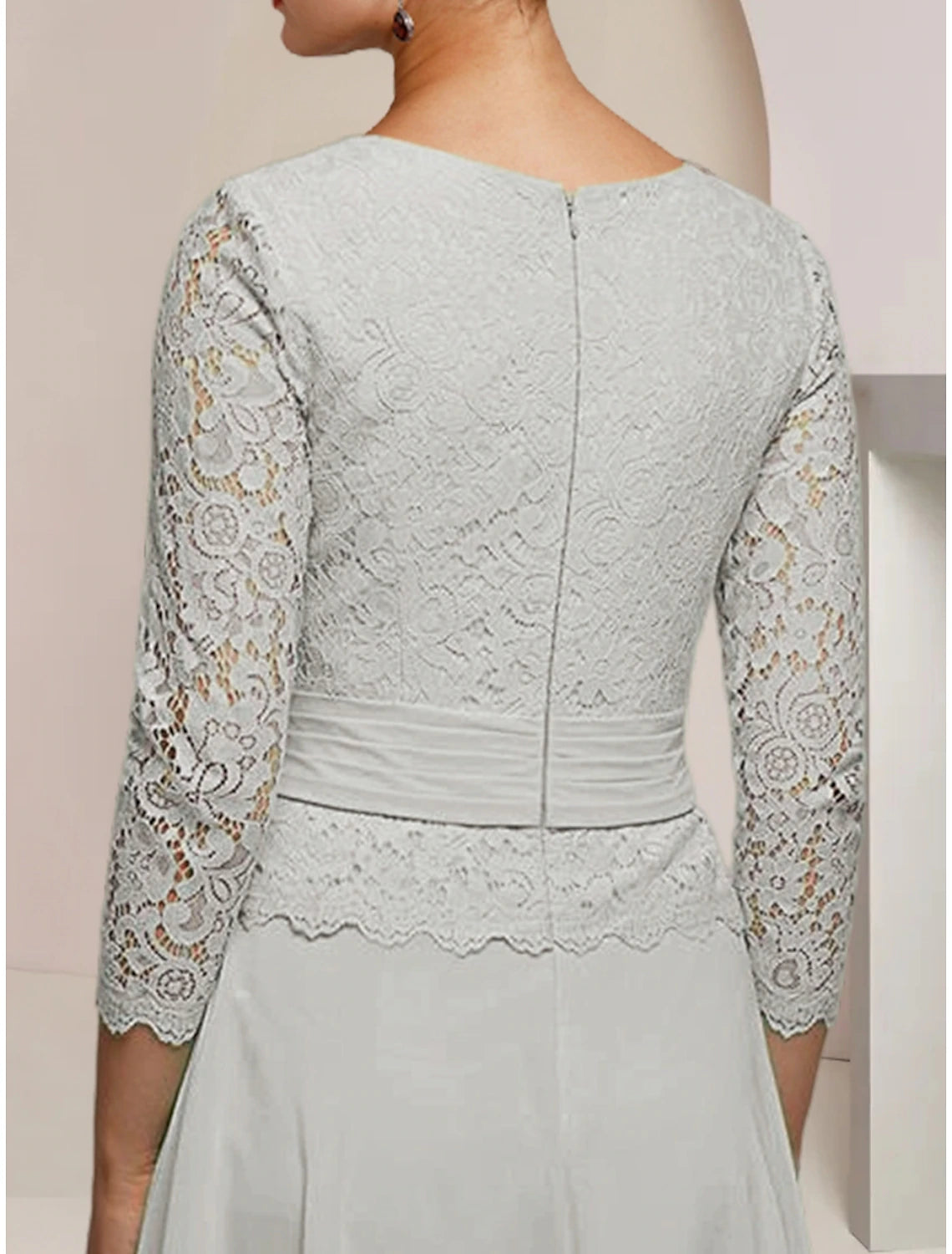 Full length view of the A-line wedding guest dress.