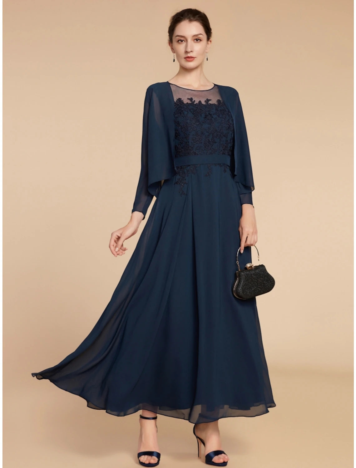 Woman posing in a navy blue formal dress, emphasizing the sophisticated style and comfortable fit.