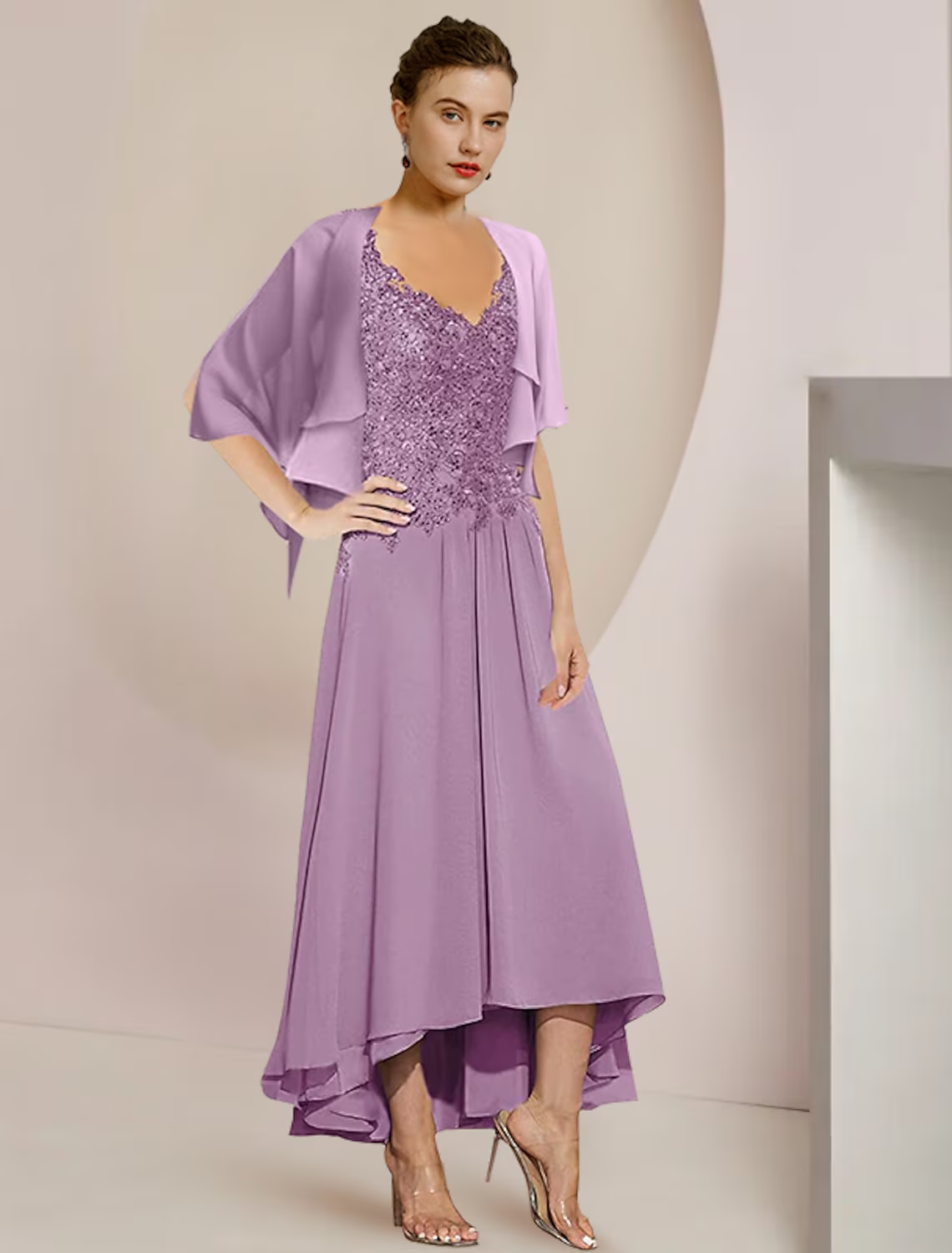 Model wearing the elegant two-piece dress, demonstrating its flow and fit.
