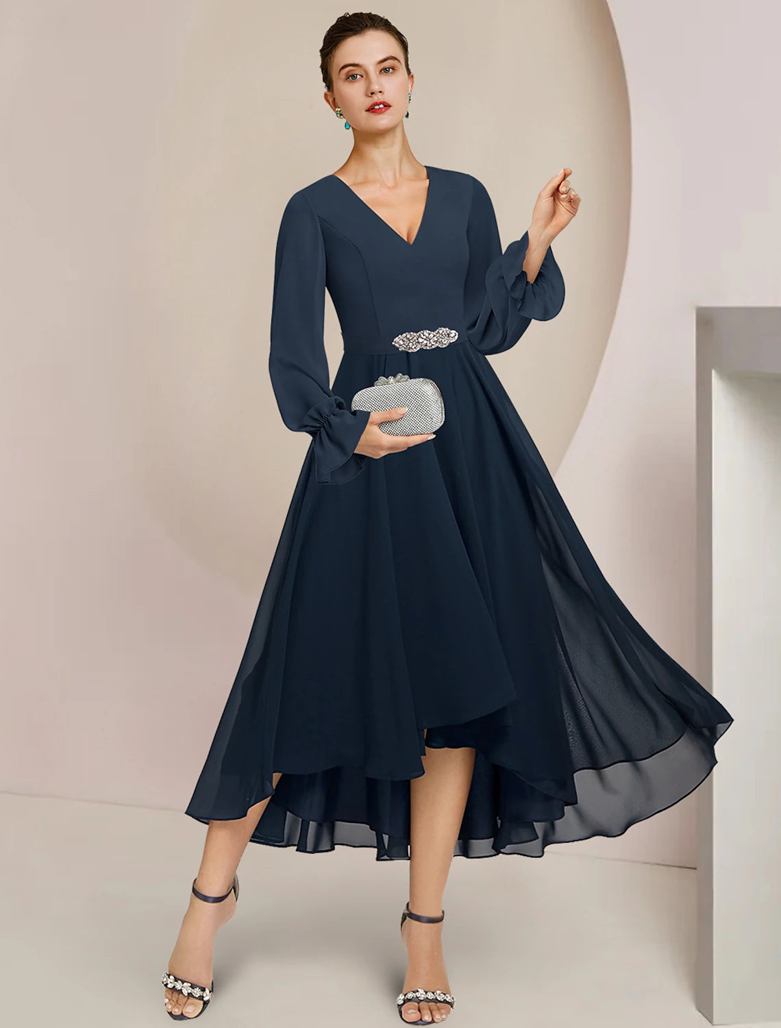 Elegant A-line chiffon dress with long sleeves and high-low tea length.