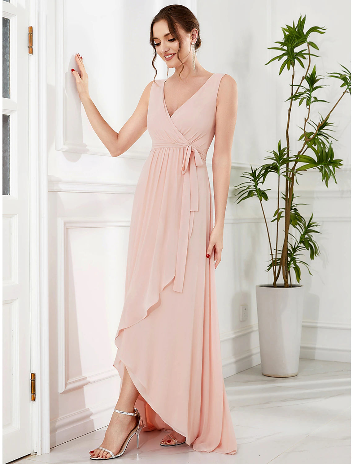Side view of the A-line chiffon maxi dress, highlighting the ruffles and slit.