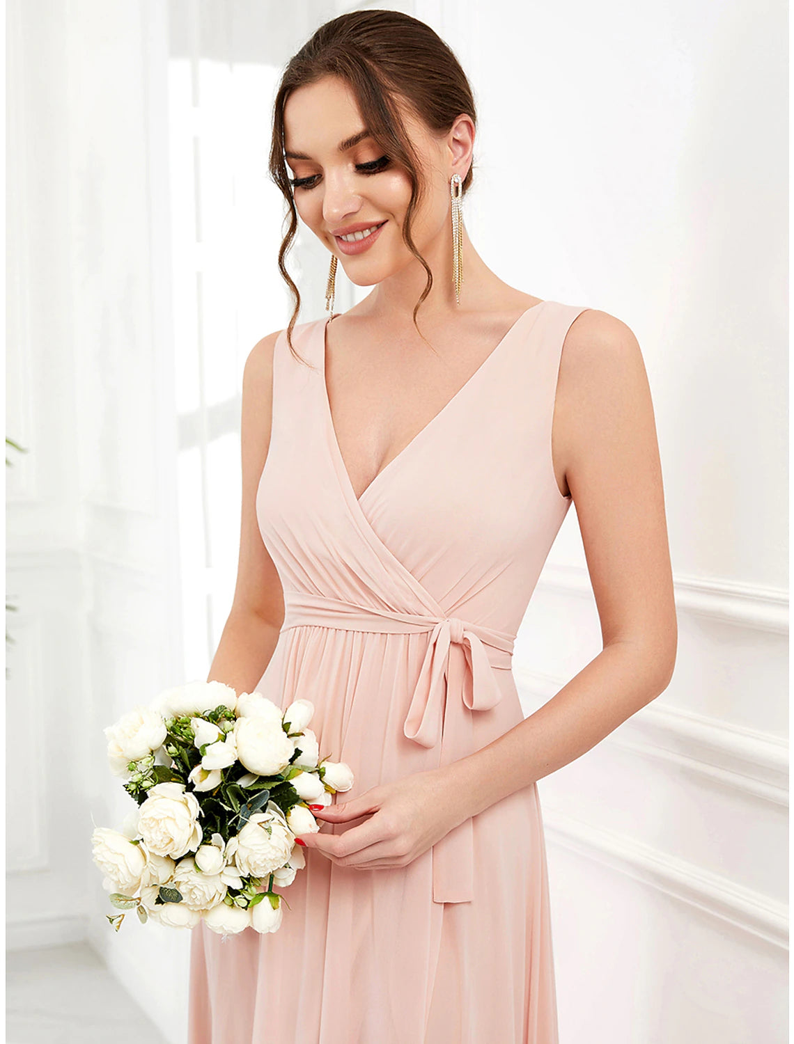 Close-up of the chiffon fabric and ruffle details on the A-line dress.