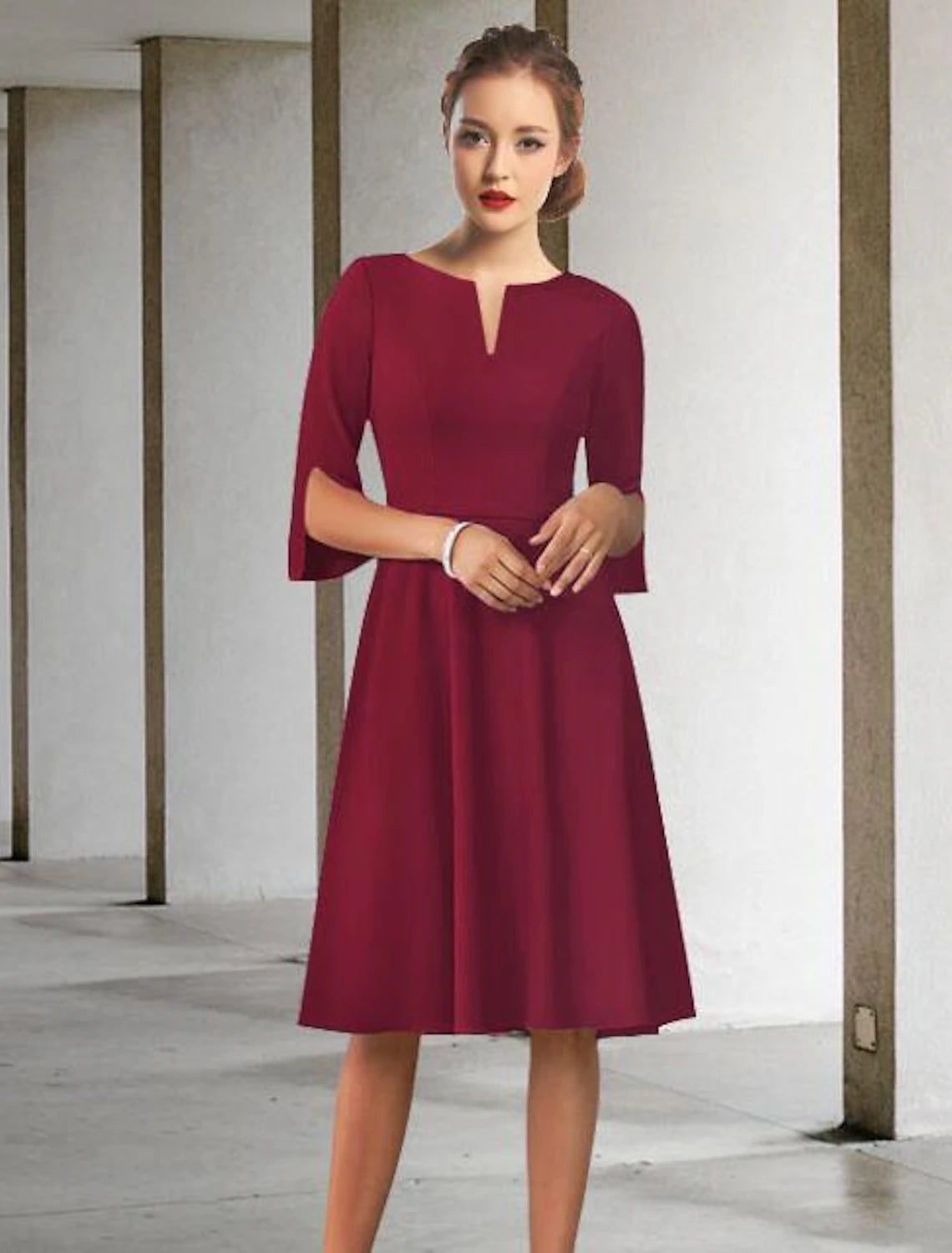 Side view of the A-line chiffon dress, showing half sleeves and knee length.