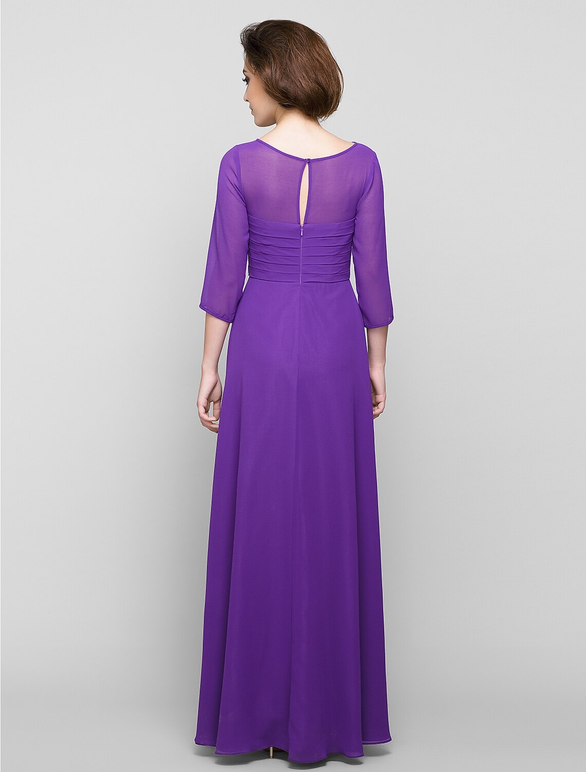 Back view of the A-line chiffon dress, showing ruched detailing.