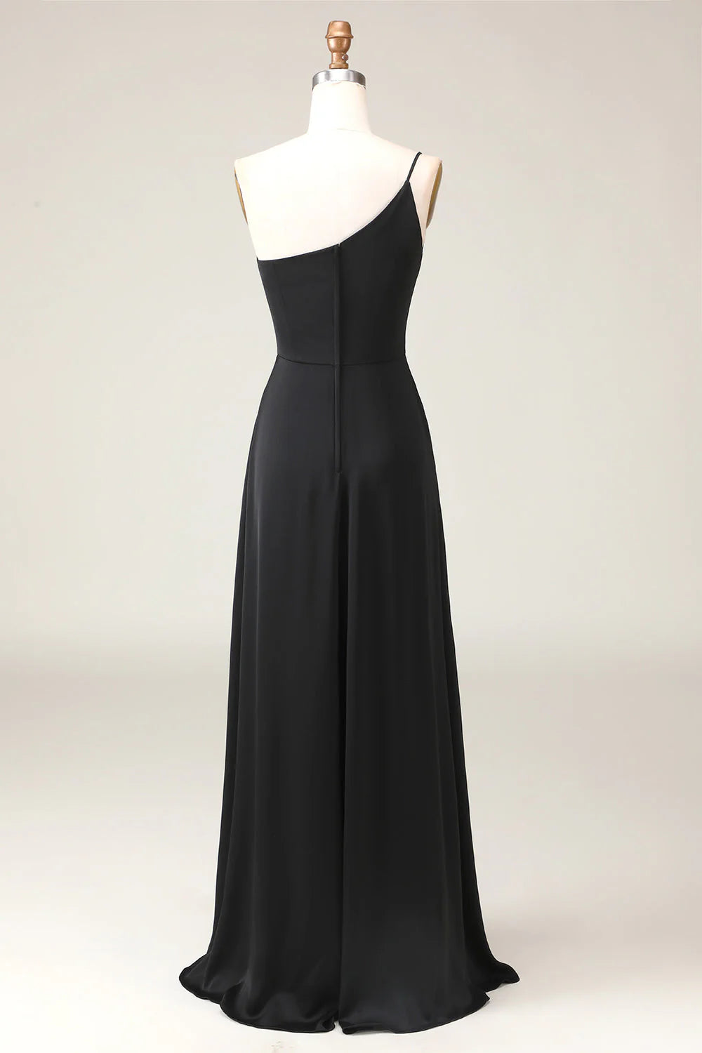 Back view of an A-line chiffon one-shoulder bridesmaid dress, showing the flowing skirt.