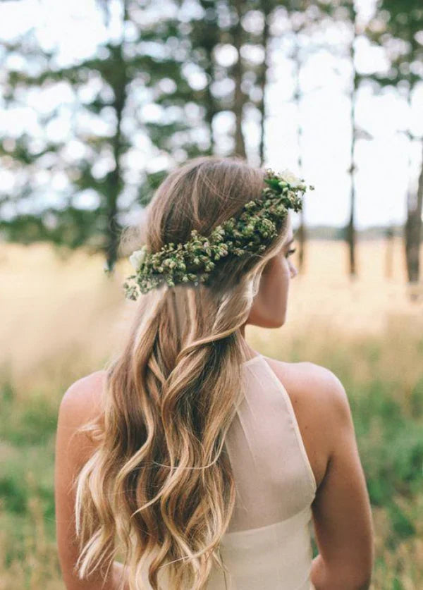 Back view of a bohemian A-line chiffon wedding dress.