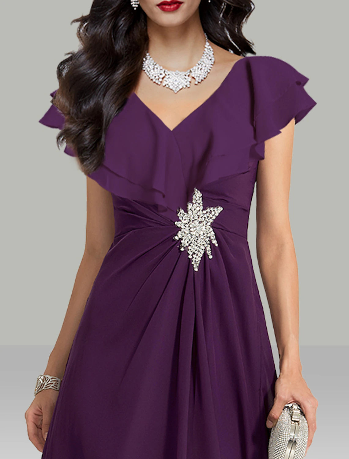 Side profile of the elegant V-neck short sleeve chiffon dress.