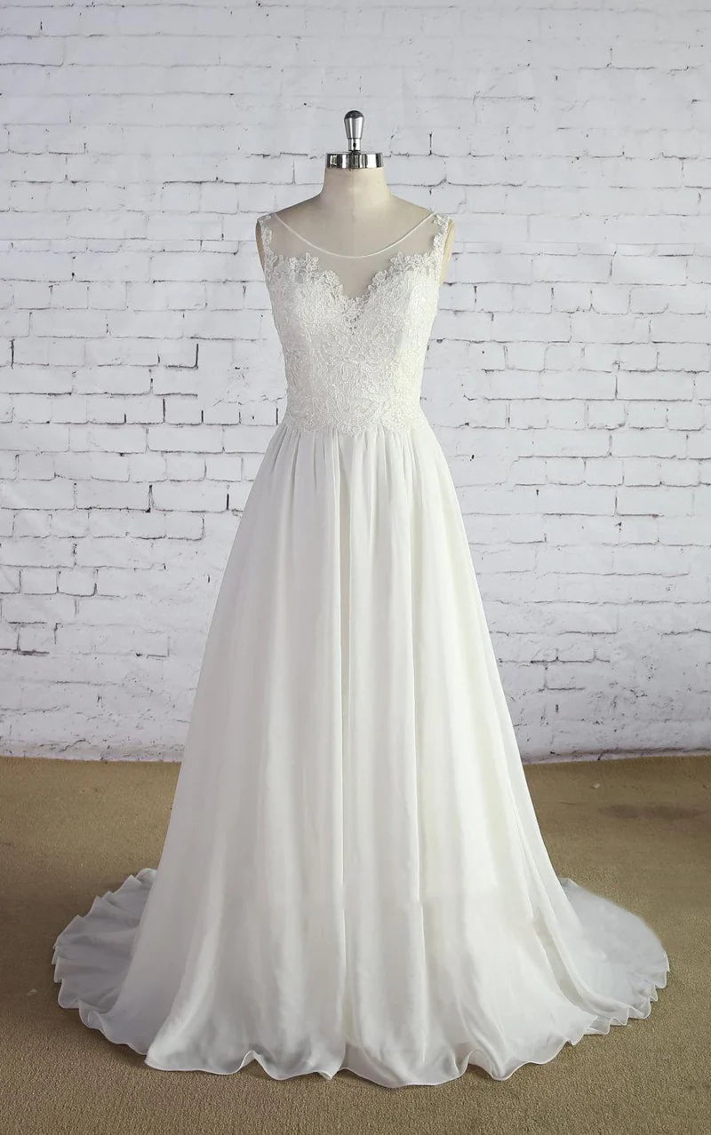 Elegant A-line chiffon wedding dress with a detailed lace bodice.