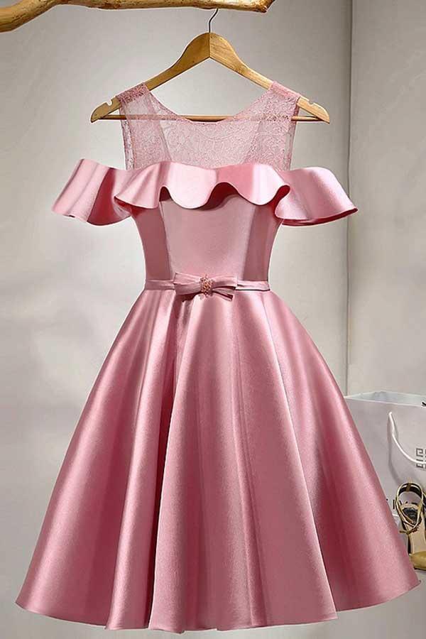 Pink A-line knee-length homecoming dress with lace and cold shoulder design.